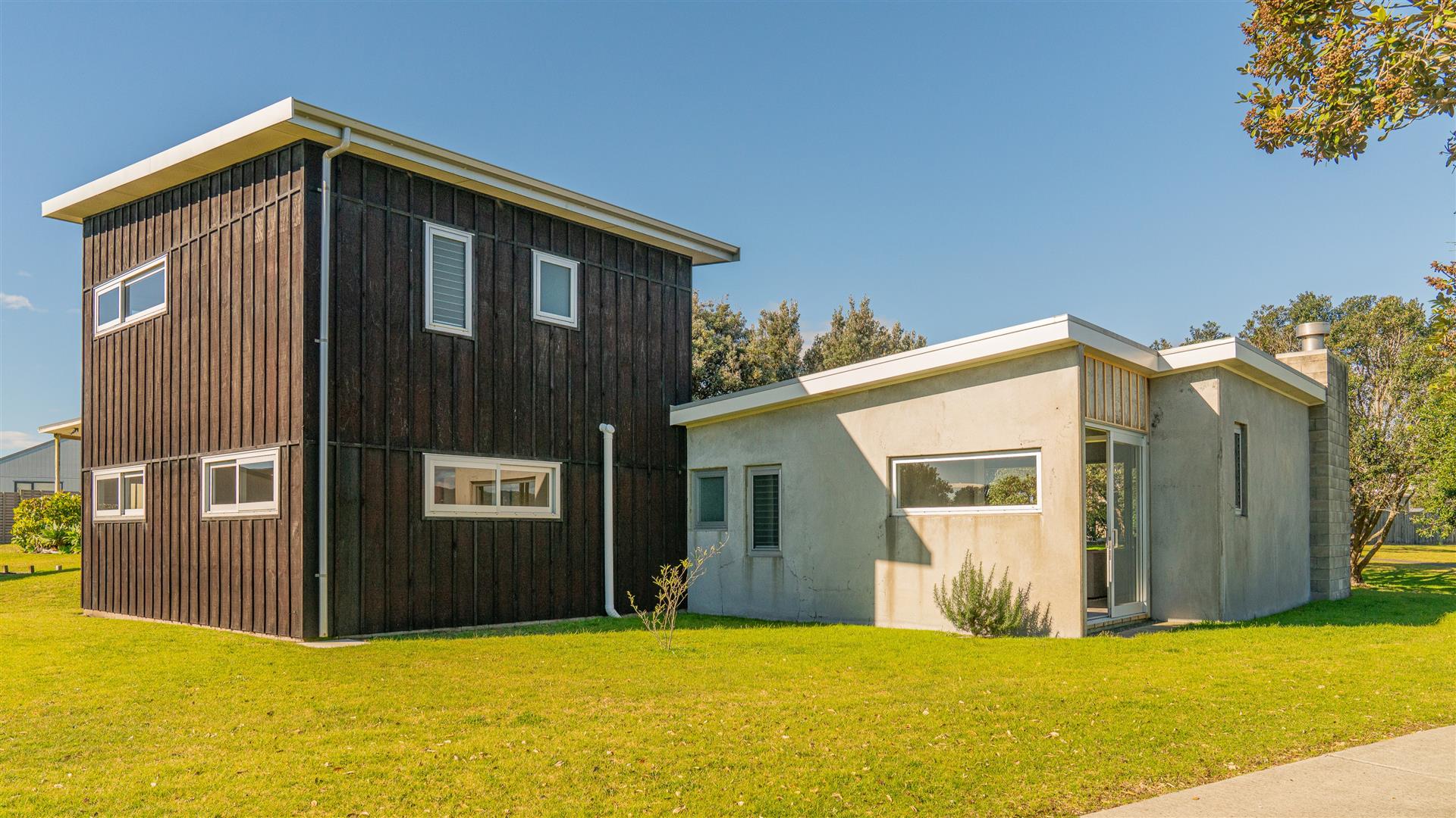 Distinctive timber and concrete architecture of the home